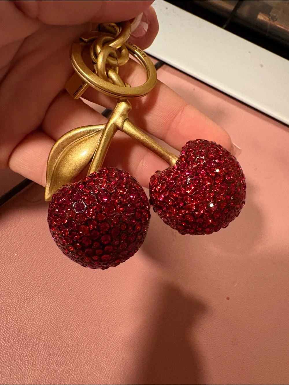 Coach Gold-Tone Cherry Charm Keychain with Red Crystals